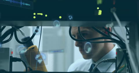 Engineer Analyzing Server Data with Futuristic Interface