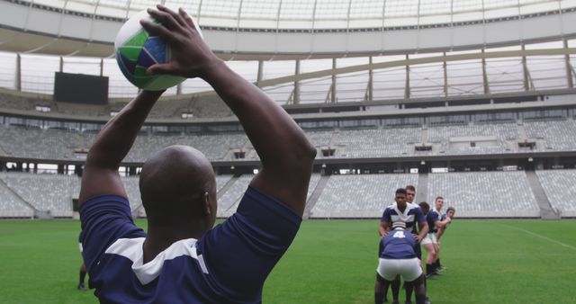 Rugby Player Throwing Ball in Stadium During Training - Download Free Stock Images Pikwizard.com