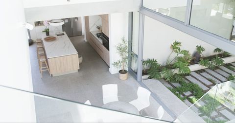 Contemporary Kitchen Design Blends with Indoor Garden Feature - Download Free Stock Images Pikwizard.com