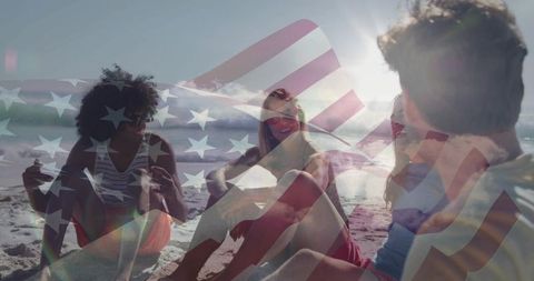 Friends Enjoying Sandy Beach with Patriotic Spirit