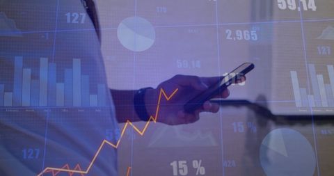 Virtual Data Analysis Interface with Handheld Smartphone Behind Graphs - Download Free Stock Images Pikwizard.com