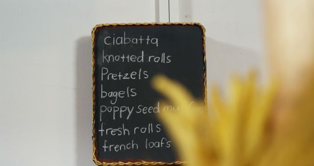 View of menu written on chalkboard at bakery section of supermarket