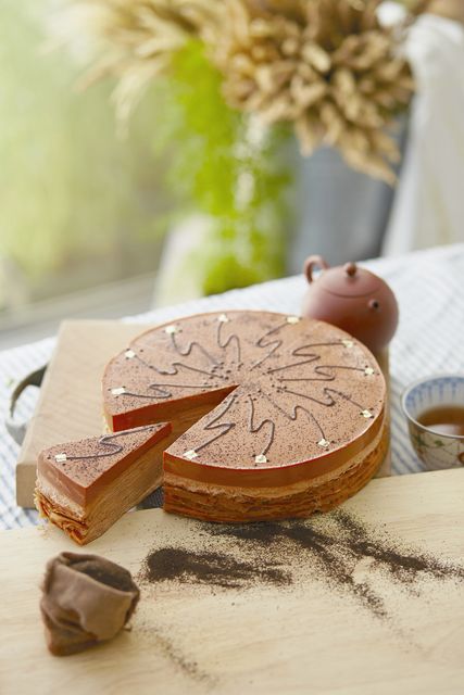 Delicious Chocolate Cake with Artistic Toppings on Wooden Board - Download Free Stock Photos Pikwizard.com