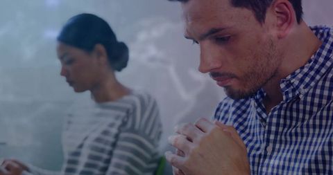 Business professional collaborating with digital world map focus