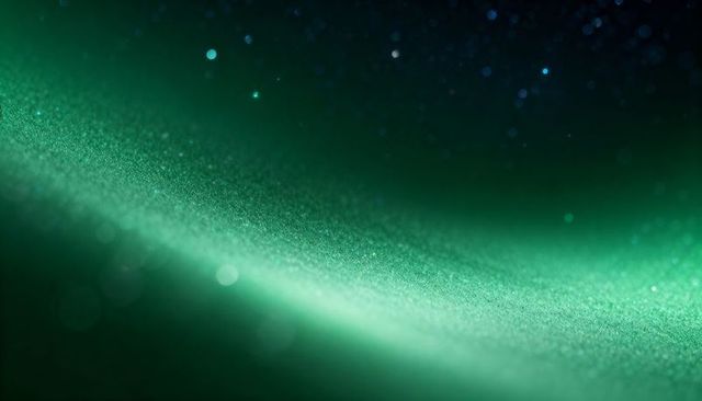 Shimmering green macro texture with diagonal ridge, glitter bokeh and soft gradient