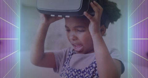 African American Girl Experiencing VR Technology with Neon Graphics