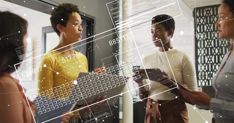 Diverse Team Engaging in Data Analysis Meeting