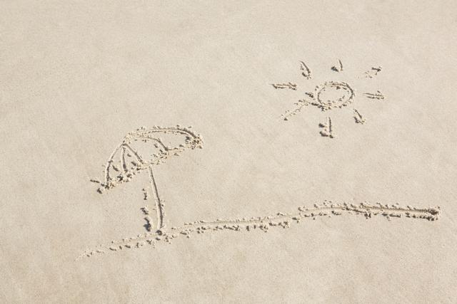 Sun and umbrella drawn on sand at beach