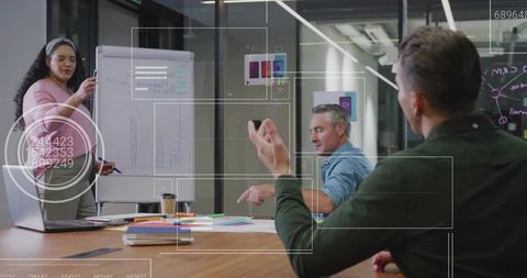 Businesswoman Presenting Ideas in Modern Office Meeting