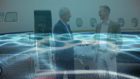Businessmen Shaking Hands with Digital Network Overlay