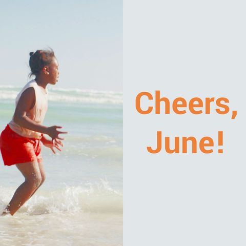 Joyful african american girl playing at seaside