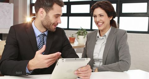 Business Colleagues Discussing Ideas with Tablet in Modern Office - Download Free Stock Images Pikwizard.com