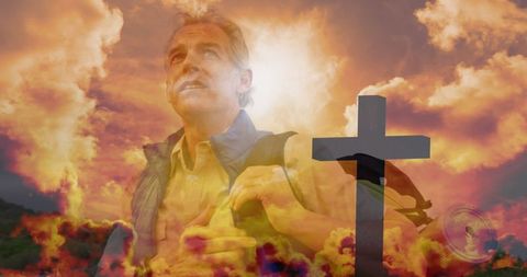 Senior Man Hiking Reflective with Cross at Sunset