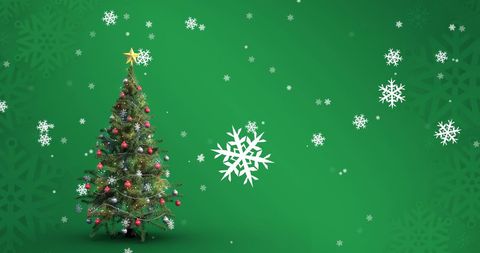 Festive Christmas Tree with Falling Snowflakes Decoration