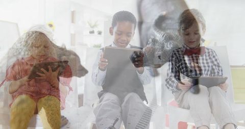 Children Using Tablets for Digital Learning in Classroom