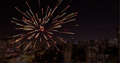 Spectacular Fireworks Lighting Up Urban Night Skyline - Download Free Stock Images Pikwizard.com