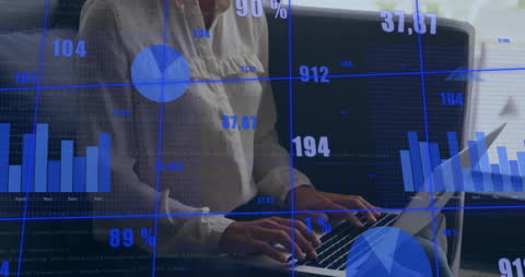 Businesswoman Analyzing Data on Laptop with Futuristic Blue Overlay