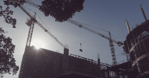 transparent silhouette of construction cranes against clear sky - Download Free Stock Videos Pikwizard.com