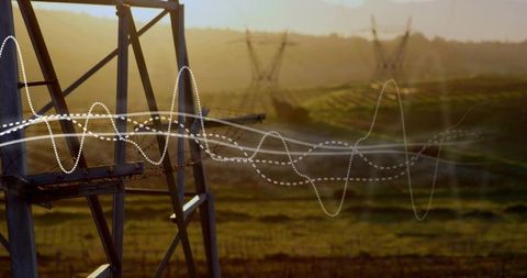 Backlit power transmission tower with waveform overlay over terraced rural fields