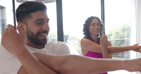 Biracial Couple Enjoys Relaxing Yoga at Home