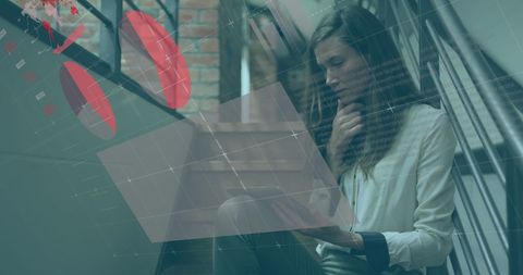 Businesswoman Analyzing Digital Data with Tablet at Office Staircase