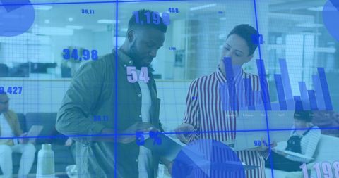 Diverse Coworkers in Collaborative Business Strategy Meeting with Data Overlay