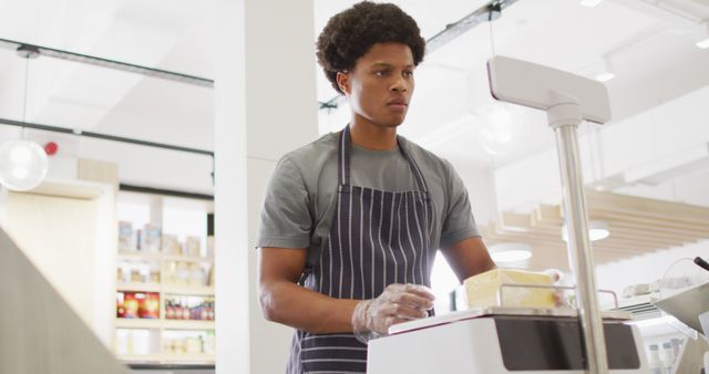 Grocery Store Employee Weighing Cheese at Checkout Counter - Download Free Stock Images Pikwizard.com