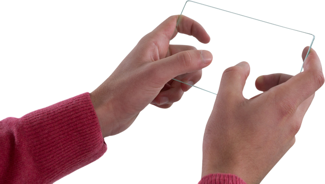 Close-Up of Hands Holding Transparent Glass Device Interface - Download Free Stock Videos Pikwizard.com