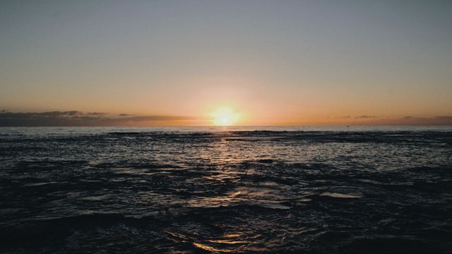 Serene Sunset over Tranquil Ocean Waves - Download Free Stock Photos Pikwizard.com