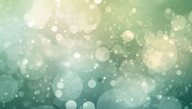 Ethereal green bokeh lights abstract background with soft glowing circles and sparkles