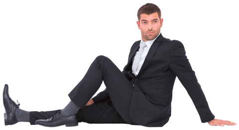 businessman sitting on floor in black suit with pensive look transparent - Download Free Stock Videos Pikwizard.com
