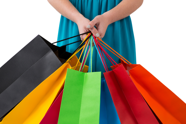 Woman Holding Colorful Shopping Bags on Transparent Background - Download Free Stock Videos Pikwizard.com