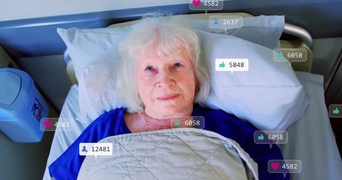Elderly Woman in Hospital Connecting Through Social Media