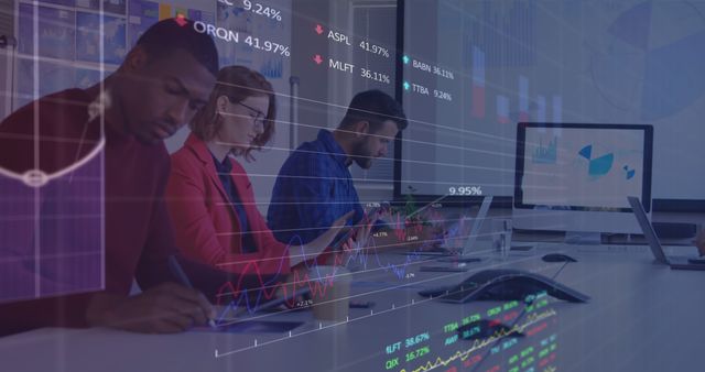 Image of stock market data processing against diverse team of colleagues working at office - Download Free Stock Photos Pikwizard.com