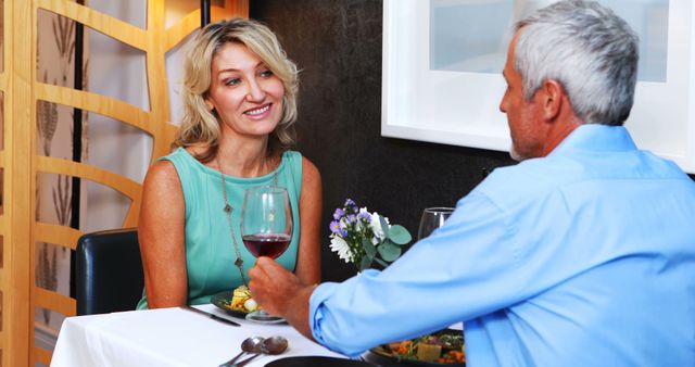 Senior Couple Enjoying Dinner Date at Cozy Restaurant - Download Free Stock Images Pikwizard.com