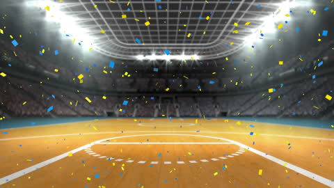 Colorful Confetti Falling in a Brightly Lit Sports Stadium