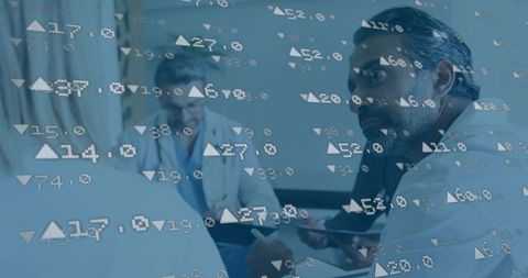 Medical Specialists Analyzing Data in Modern Conference