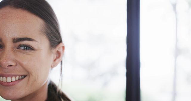 Half Portrait of Young Woman Smiling Indoors - Download Free Stock Images Pikwizard.com