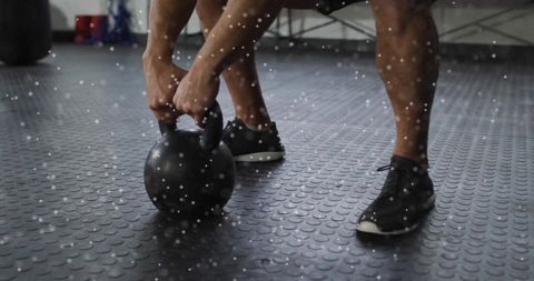 Strong Workout with Kettlebell in a Gym Setting