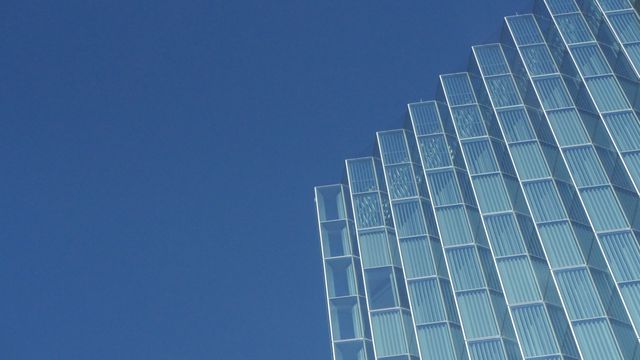 Modern Glass Building Against Clear Blue Sky - Download Free Stock Photos Pikwizard.com
