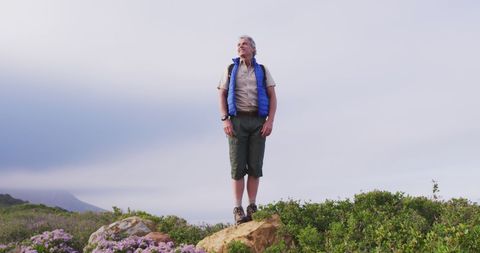 Senior Man Enjoying Mountain Adventure Amidst Nature - Download Free Stock Images Pikwizard.com