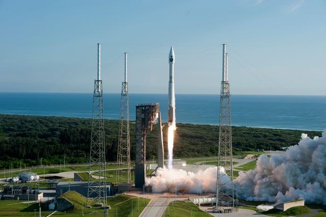 Atlas V rocket launching from Cape Canaveral carrying TDRS-M satellite. Use for topics on space exploration, NASA missions, and rocket launches. Ideal for articles, educational materials, and space events promotion.