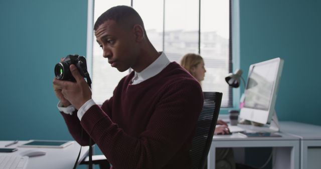 Creative Professional Taking Photo in Modern Office Workspace - Download Free Stock Images Pikwizard.com