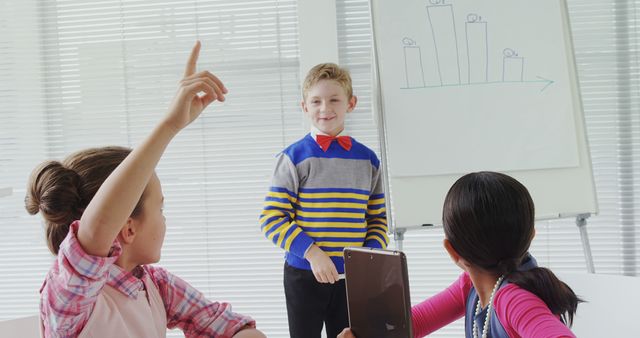 Children Engaging in Class Presentation with Graph - Download Free Stock Images Pikwizard.com