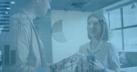Business Professionals Engaged in Data Analysis with Virtual Graphics Overlay - Download Free Stock Images Pikwizard.com