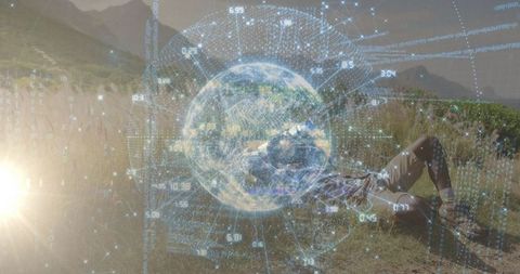 Hiker viewing holographic globe in nature during sunset