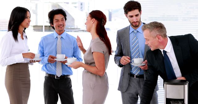 Diverse Colleagues Talking and Enjoying Coffee Break at Office - Download Free Stock Images Pikwizard.com