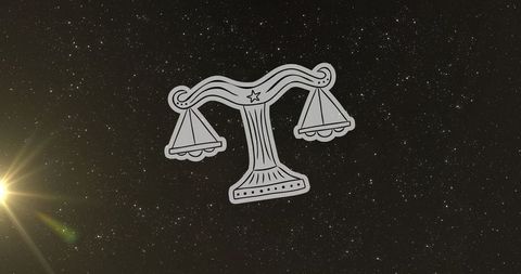 Libra zodiac symbol over starry cosmos with sun flare