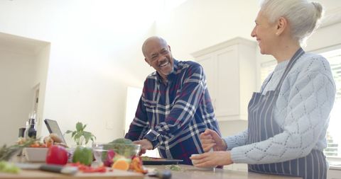 Elderly Couple Enjoying Cooking Together with a Tablet in Modern Kitchen - Download Free Stock Images Pikwizard.com