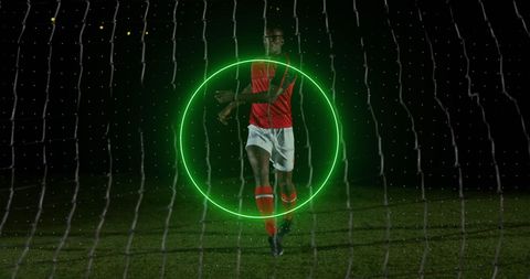Neon Shapes Surrounding Soccer Player on Field